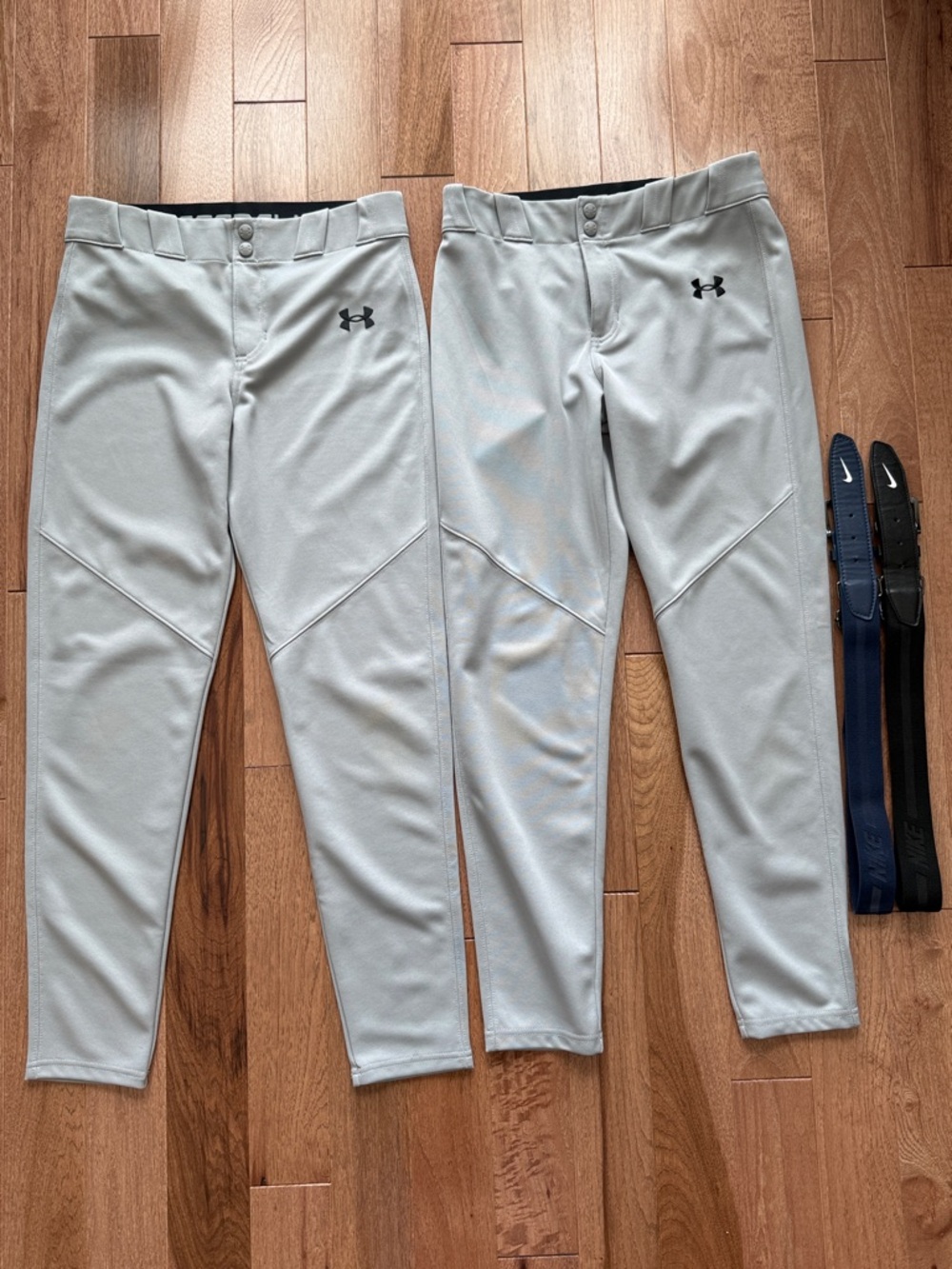 Bundle of Under Armour baseball pants and Nike belts Large youth L